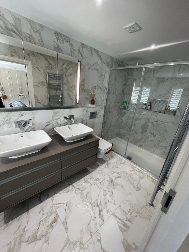 Marble en-suite with twin vanity - VED Construction