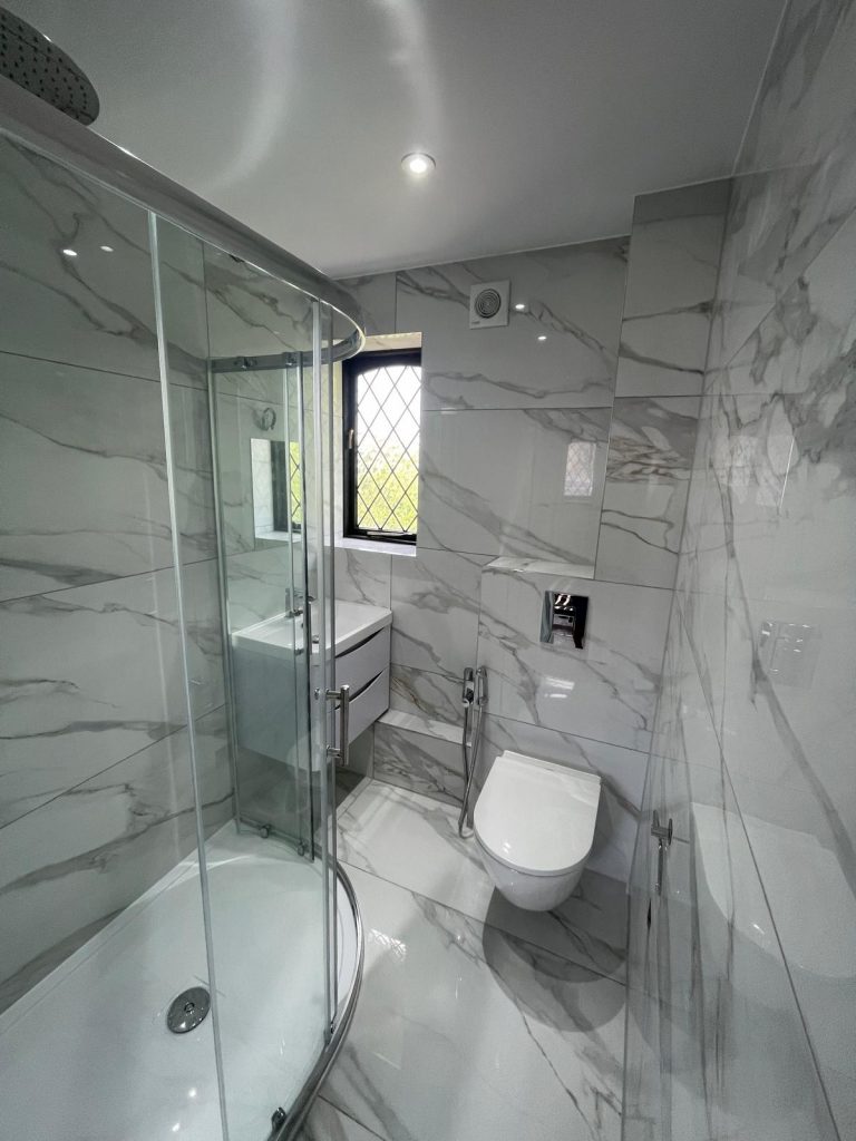 Frameless glass shower screen - VED Construction